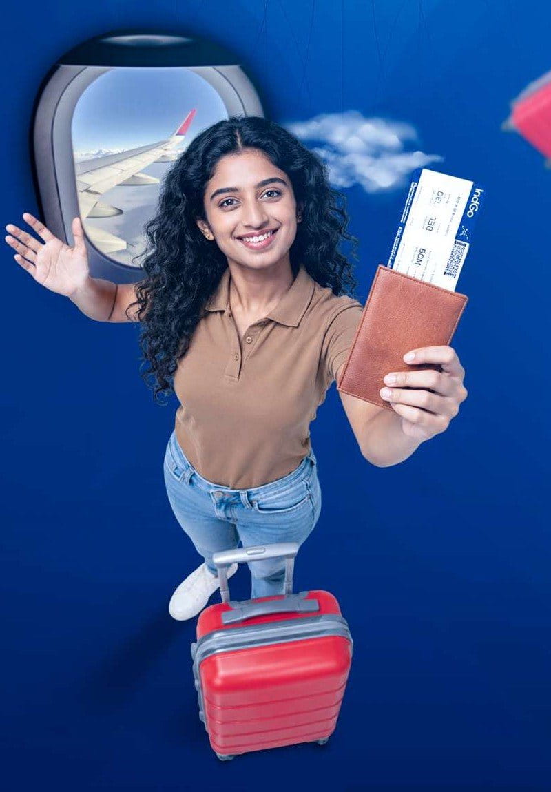 Traveller holding flight tickets and boarding pass